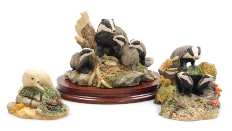 A Border Fine Arts sculpture modelled as Evening Shadows, SOC7, with wooden base, further figure group of badgers, and a seal pup. (3)