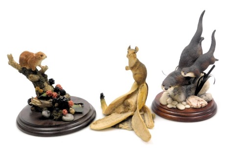 A Border Fine Arts sculpture of River Mystery, MTR06, Country Artists figure group of harvest mice with blackberries, and Border Fine Arts sculpture of a rat atop a banana. (3)