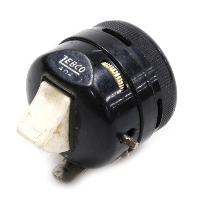 A Zebco 404 close faced automatic fishing reel.