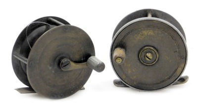 Two early 20thC fishing reel winches, one brass reel stamped Made in England, 6.5cm diameter, the other reel with brass and alloy, 6.5cm diamter. (2)