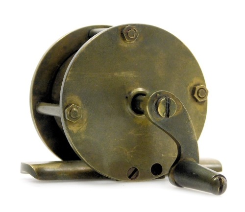 A Hardy mark 4 brass fishing winch reel, 10cm diameter.