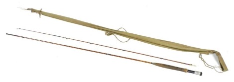 A vintage built cane fly fishing rod, 150cm, with canvas bag.