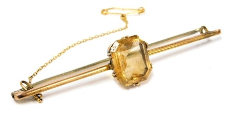 A 9ct gold and citrine bar brooch, with safety chain as fitted, 5.8g.