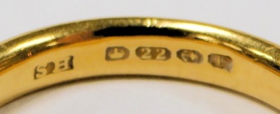 A 22ct gold wedding band, size P, 5.7g. - 2