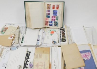 Philately. GV-EII definitives and commemoratives, mint and used, and world stamps, in an album, and loose, together with first day covers. - 2