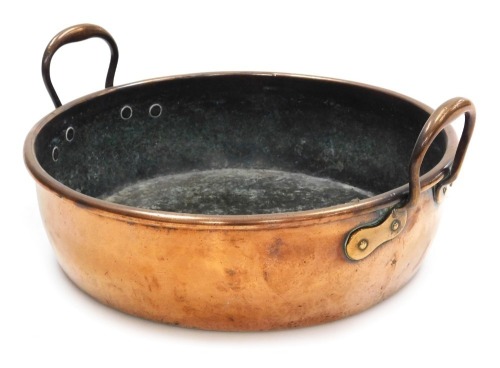 A Victorian twin handled copper preserving pan, 40cm wide.