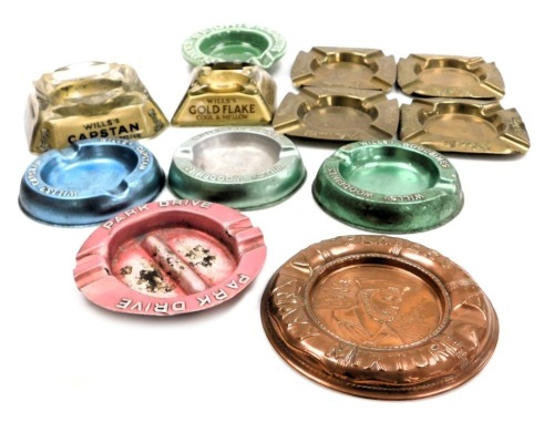 A group of early 20thC metal and glass ashtrays, advertising Wills's Capstan Navy Cut cigarettes, Golden Flake, Park Drive, Wills's Woodbines, and Capstan. (12)