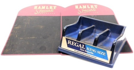 A vintage Regal King Size plastic cigarette packet holder, of blue three sectional form, 30cm wide, and a pair of Hamlet Special Panatellas metal chalk boards. (3)