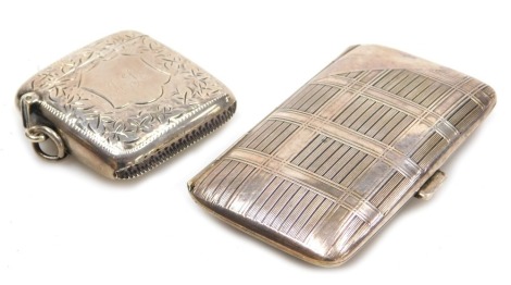 A continental silver cigarette case, with engraved checkered design, triangular vacant reserve, bears marks, 1.45oz, together with a Victorian silver vesta case, with engraved foliate decoration, stipple engraved shield reserve, Birmingham 1900, 0.82oz. (