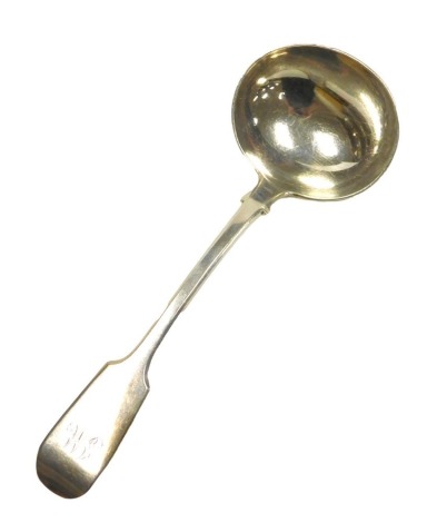 A Victorian silver cream ladle, monogram engraved, London 1859, 2.38oz.