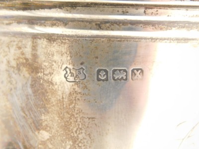 A George VI silver christening cup, monogram engraved, Birmingham 1947, together with a Georgian silver teaspoon, 2.39oz. - 2