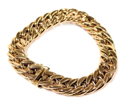 A 9ct gold gentleman's curb link bracelet, on a snap clasp, 35.1g.