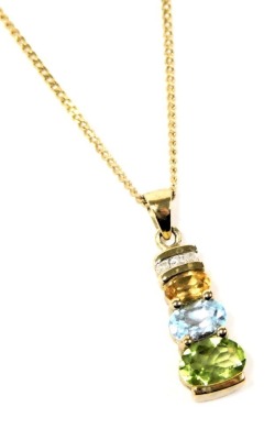 A 9ct gold diamond and gem set pendant, with oval cut citrine, aquamarine and peridot, on a curb link neck chain, with bolt ring clasp, 3.4g.