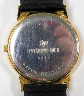 A Raymond Weil gentleman's gold plated wristwatch, black dial bearing Roman numerals, centre seconds, date aperture, stainless steel back, number 5542, on a leather strap. - 3