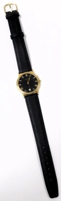 A Raymond Weil gentleman's gold plated wristwatch, black dial bearing Roman numerals, centre seconds, date aperture, stainless steel back, number 5542, on a leather strap. - 4