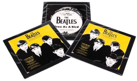 Three Beatles record shop mounted displays, that were never used, Free as a Bird 1995, and Love Me Do, 30th Anniversary 1962-92. (2)