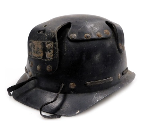 A vintage mid century Huwood light coal miner's hard hat.