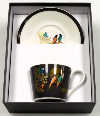 A Portmeirion porcelain breakfast cup and saucer, designed by Sara Miller, decorated with birds, on a brown ground, printed marks, boxed. - 5