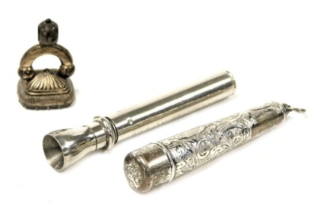 A George V silver cigarette holder, and case, foliate engraved, Birmingham 1910/1911, a William Whiteley's Scotch Whiskys "King's Ransom" "House of Lords" cigar pricker, and a 19thC fob seal, with an engraved intaglio. (3)