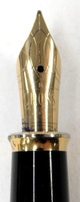 A Parker 51 fountain pen, 14ct gold plated pen, Parker 35 fountain pen, and a Cross fountain pen. (4) - 5