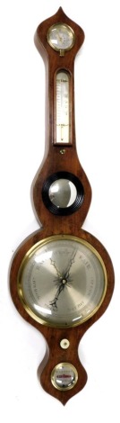 A Georgian mahogany cased wheel barometer, by R Griffith of Abergele, silvered dial, dry damp dial, thermometer and spirit level, the case with ebony and boxwood line inlay, 94cm high.