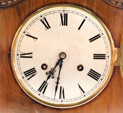 An Edwardian mahogany mantel clock, silvered dial bearing Roman numerals, Gustav Becker eight day movement, with rod strike, the case with a shaped pediment, raised on a plinth base, with presentation plaque, with pendulum and key, 35cm high, 25cm wide. - 3