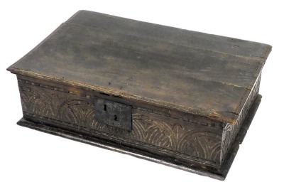 A 17thC oak chest, with a repeating foliate carved panelled front and sides, 77cm wide, 50cm deep.