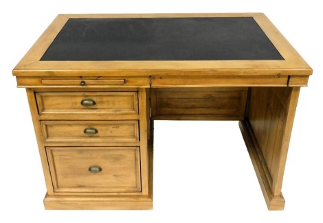 A Barker & Stonehouse light oak single pedestal desk, with black leatherette inset top, above a slide and tray drawer, over three graduated drawers, and a side cupboard, raised on a plinth base, 82cm high, 124cm wide, 79cm deep.