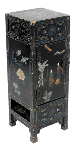 A Chinese black lacquer and painted side cupboard, with a side frieze drawer and cupboard door to front, decorated all over with flowers, birds and figures in a garden, raised on square legs, brass capped, 76.5cm high, 28cm wide, 28cm deep.