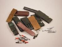 A quantity of leather pen cases