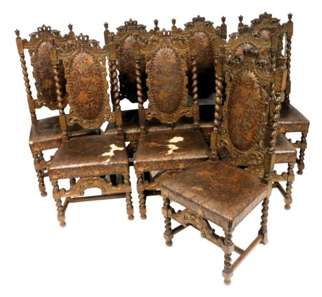 A set of eight Myrstedt & Sterns Stockholm 17thC style oak single dining chairs, with a crown and foliate carved crest rail, overstuffed tooled leather back, flanked by spiral twist columns, overstuffed tooled leather seat, raised on spiral twist legs, un