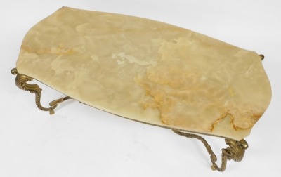 A late 20thC onyx and brass coffee table, with a serpentine top, raised on four leaf scroll cabriole legs, united by a X shaped stretcher, 45cm high, 115cm wide, 58cm deep. - 2