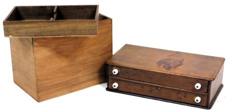 A Victorian pine serving box, with two long frieze drawers having ceramic knob handles, 15cm high, 54cm wide, 29cm deep, together with a pine housemaid's box, with tray inset, 34cm high, 43cm wide, 28cm deep. (2)