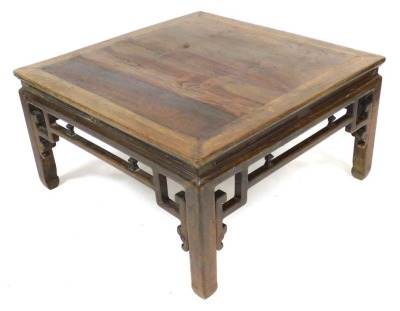 A late 19thC Chinese elm low centre table, of square section, with a carved frieze, raised on square legs, 50cm high, 93cm wide, 93cm deep.