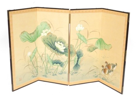 A Japanese four fold table screen, with paper panels, painted with ducks and water lilies, signed, 89cm high, 39cm wide, 156cm extended. (AF)