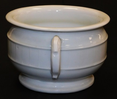 A Qing dynasty 18thC blanc-de-chine censer, the body moulded with a squared scrolling band with two stylized phoenix loop handles to either side below a rolled rim, 15.5cm wide. For an almost identical example, see lot 101 at the March 21st 2011 auction a - 2