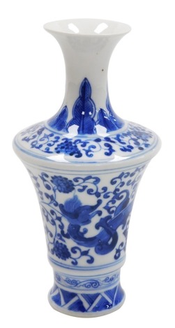 A Chinese porcelain blue and white vase, of shouldered tapering form, decorated with a stylised dragon, flowers and scrolling leaves, Artemisia leaf mark to the base, 17cm high.