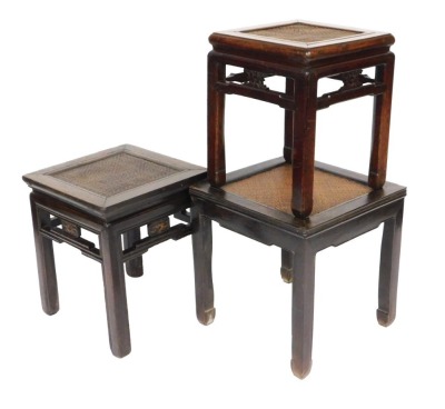 Three 19thC Chinese square cane panelled low stands, each with woven split cane tops, two with open stylised galleries, 49.5cm high, 50cm wide, 49.5cm deep, 44cm high, 52.5cm wide, 44cm deep, and 39.5cm high, 49.5cm wide, 39.5cm deep.