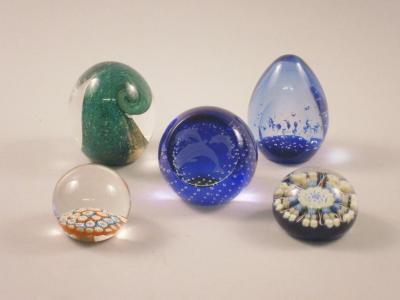 Five paperweights