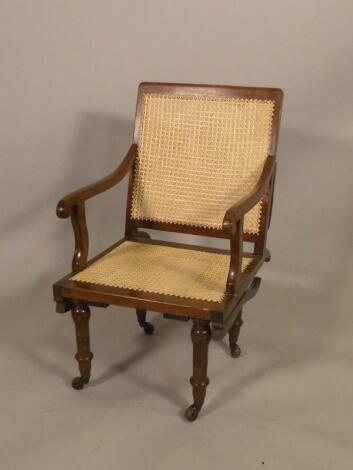 A Victorian mahogany Sedan chair by T.W. Buxton of Sheffield