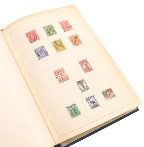 A Coronet stamp album containing British and world stamps.