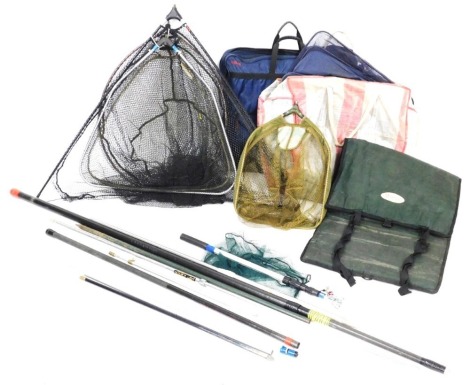 A Diawa Connoisseur fishing net bag and various landing nets, landing net pole and bank stick.