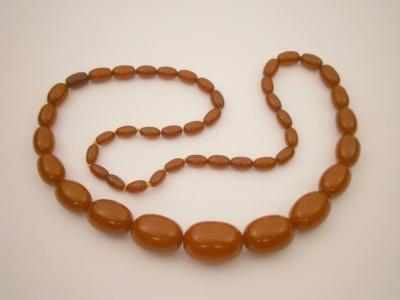 A set of graduated amber beads