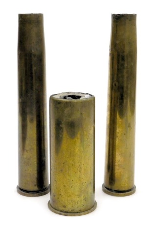 A pair of WWII brass shell cases, dated 1944, LOT 156 PP/C, 31cm high, and a further shell case, no 10, MK3K 66/60, 18cm high. (3)