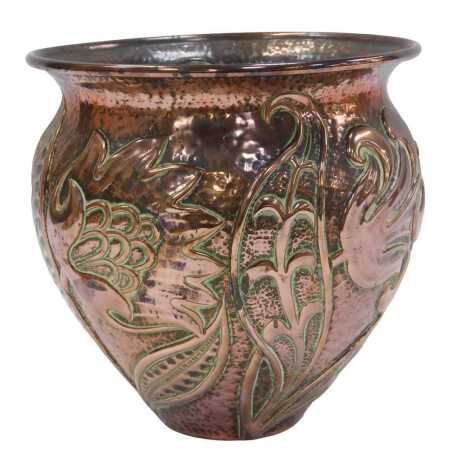 A John Pearson of Newlyn Arts and Crafts copper jardinere, of cylindrical tapering form with outswept lip, repousse decorated with flowers and leaves against a hammered ground, incised signature J. Pearson and dated1896 to underside, numbered 2301, 21.5cm