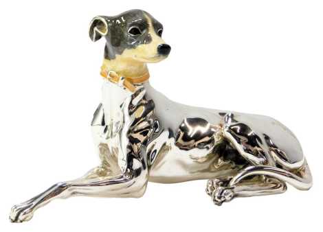 A silver and enamel figure modelled as a seated Greyhound, stamped Italy 925, 9cm high.