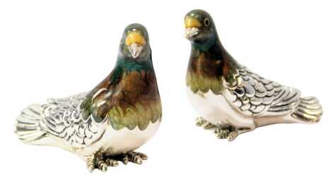 Two silver and enamel figures modelled as birds, each stamped 925, 4cm high and 3.5cm high.