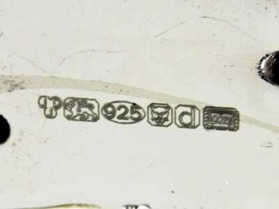 Two silver and enamel figures, modelled as a recumbent deer, stamped 925, 4.5cm high, and a fawn, 2.5cm high. - 2