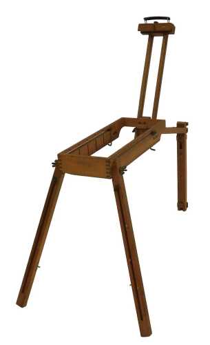 A late 20thC French beech metamorphic artist's easel, bears label, folded 59cm high.