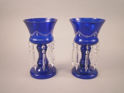 A pair of Victorian style blue glass table lustres